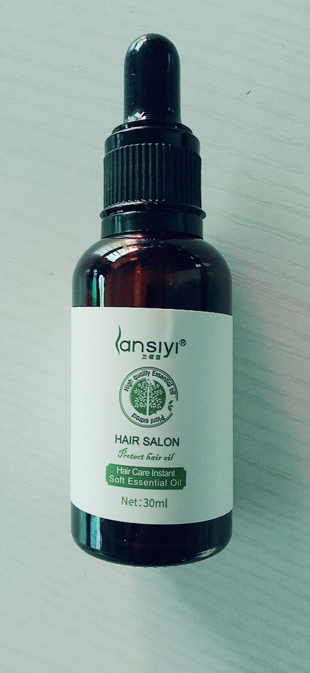 زيت عطري للعناية بالشعر